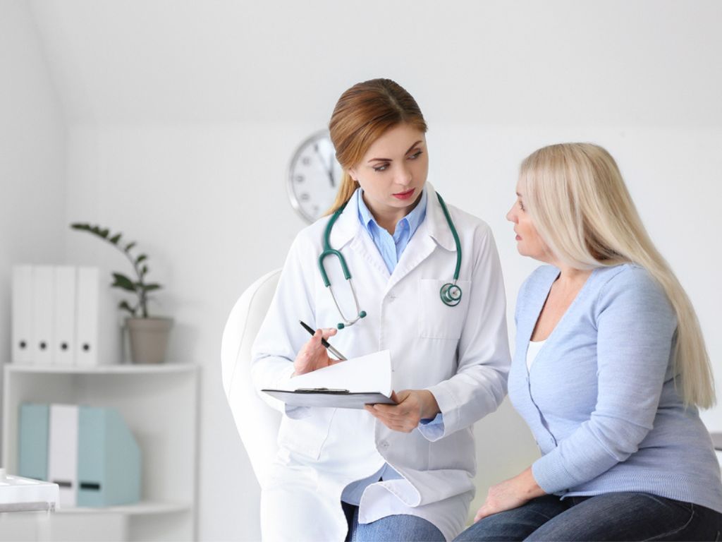doctor advising patient